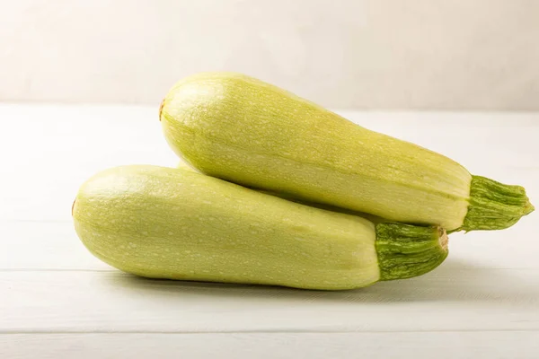 Squash Vegetable Marrow Zucchini White Texture Background Vegetarian Organic Vegetables — Fotografia de Stock
