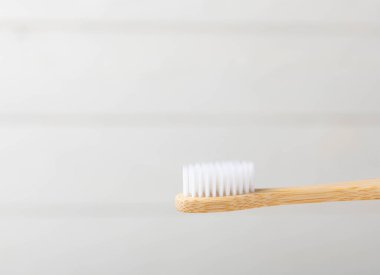 Toothbrushes. Oral care. Dental care. Composition with bamboo toothbrushes on a light background. Eco friendly.Copy space. Place for text.Fletley