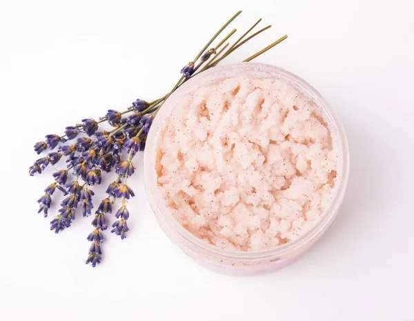 Natural lavender scrub isolated on white background.Body scrub. Body care. Sugar peeling scrub with argan oil and Himalayan salt. spa set