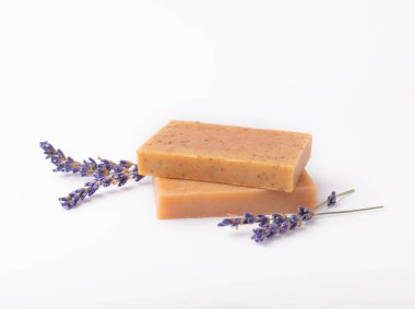 Natural soap with lavender extract. Handmade soap with lavender flowers isolated on white background. spa and relaxation concept.Aromatherapy.Flat lay.Place for text.Place for copy.