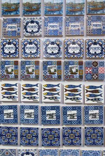 Fridge magnet in the shape of a typical tile from Oporto, Portugal.