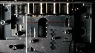 Internal mechanism of the metal lock that opens the door opens and unlocks the keyless gate