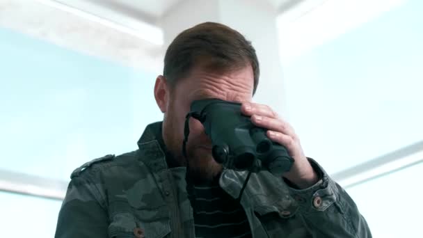Male Secret Agent Looks Special Thermal Imaging Binoculars — стоковое видео