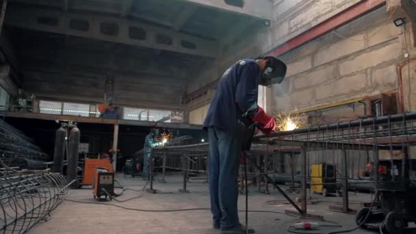 Factory Workers Huge Workshop Welds Metal Structures — Stock Video