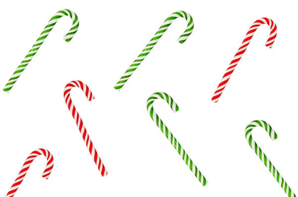圣诞节糖果红绿棒棒糖 背景为白色 孩子们享受节日糖果和糖果 — 图库照片