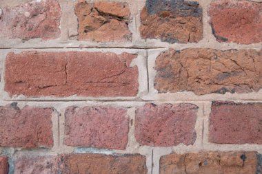 Texture of ancient stone from the docks in England. Brown, gray colors. Perfect background