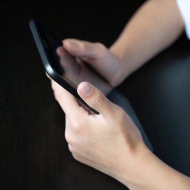Close up of childs hands with tablet
