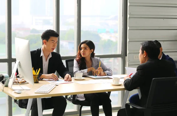 Businessman Giving Speech On Business Meeting With Colleagues, Discussing Work Ideas And Projects, Making Presentation Standing In Modern Office. Teamwork, Entrepreneurship, Corporate Meeting