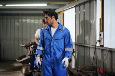 Workers changing and repair part of wheels at the car service