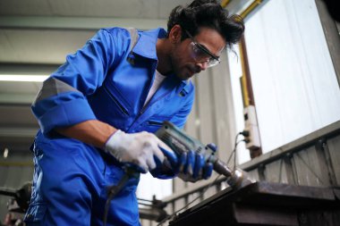 Worker changing and repair part of wheels at the car service