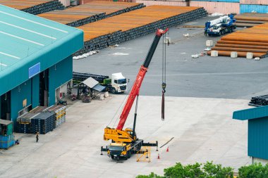 Container ships loading at Eastern seaboard harbor