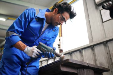 Workers changing and repair part of wheels at the car service