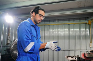 Workers changing and repair part of wheels at the car service