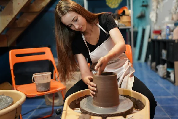 Close Concentrated Beautiful Craftswoman Apron Sitting Pottery Wheel Using Craft — Stock Photo, Image