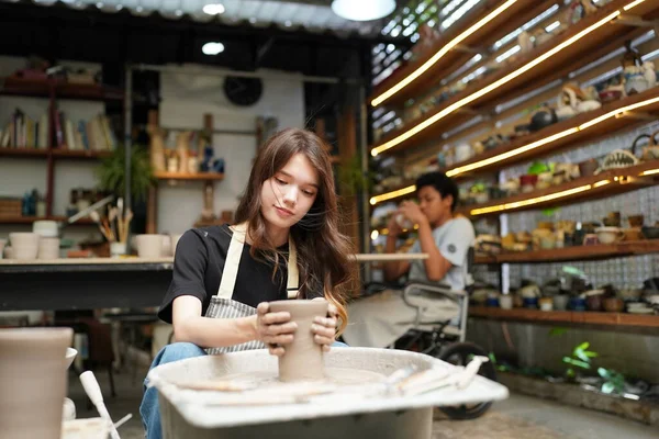 Close Concentrated Beautiful Craftswoman Apron Sitting Pottery Wheel Using Craft — Stock Photo, Image