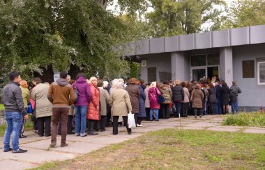 People standing in a queue to get to Dovzhenko movie studio. June 15, 2019. Kyiv, Ukraine