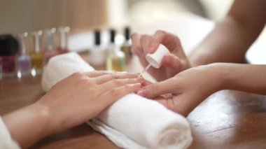 Image of a smiling manicurist 