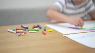Image of a boy drawing