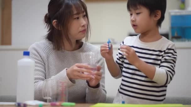 Parent Child Making Slime — Stock video