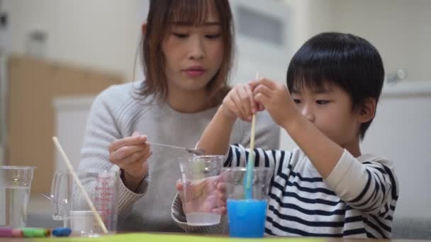 Parent Child Making Slime — Stockvideo