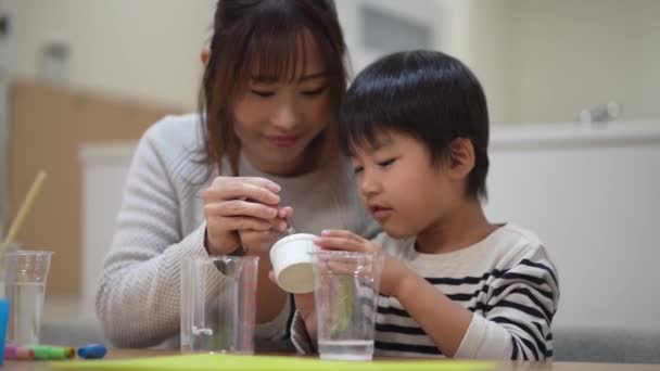 Parent Child Making Slime — Stockvideo