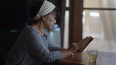 Female reading at home 