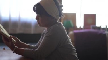 Female reading at home 