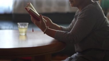 Female reading at home 
