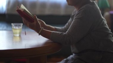 Female reading at home 