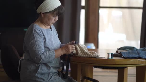 Woman Handcrafting Bag — стоковое видео