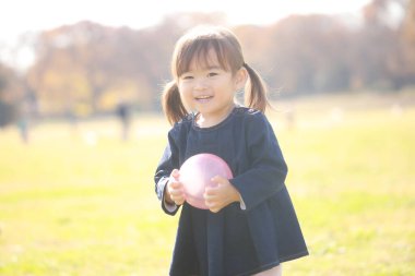 Image of a playing girl 