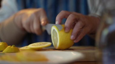 A woman making honey pickles of lemon 