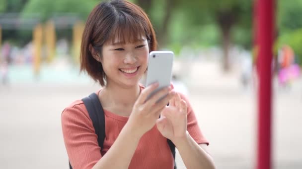 Mother Taking Picture Playing Child Smartphone — Video