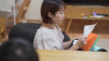 Mother who found a handout for parents in a school bag 