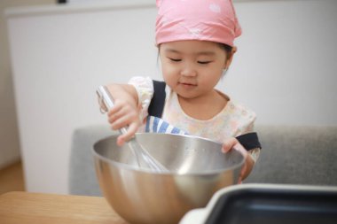 Image of a girl cooking 