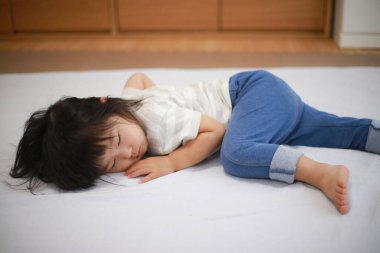 Image of a girl taking a nap 