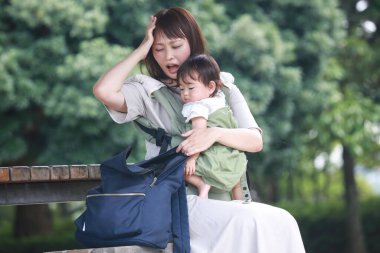 A mother who notices something left behind on the go 