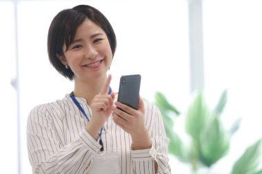 Female operating a smartphone 