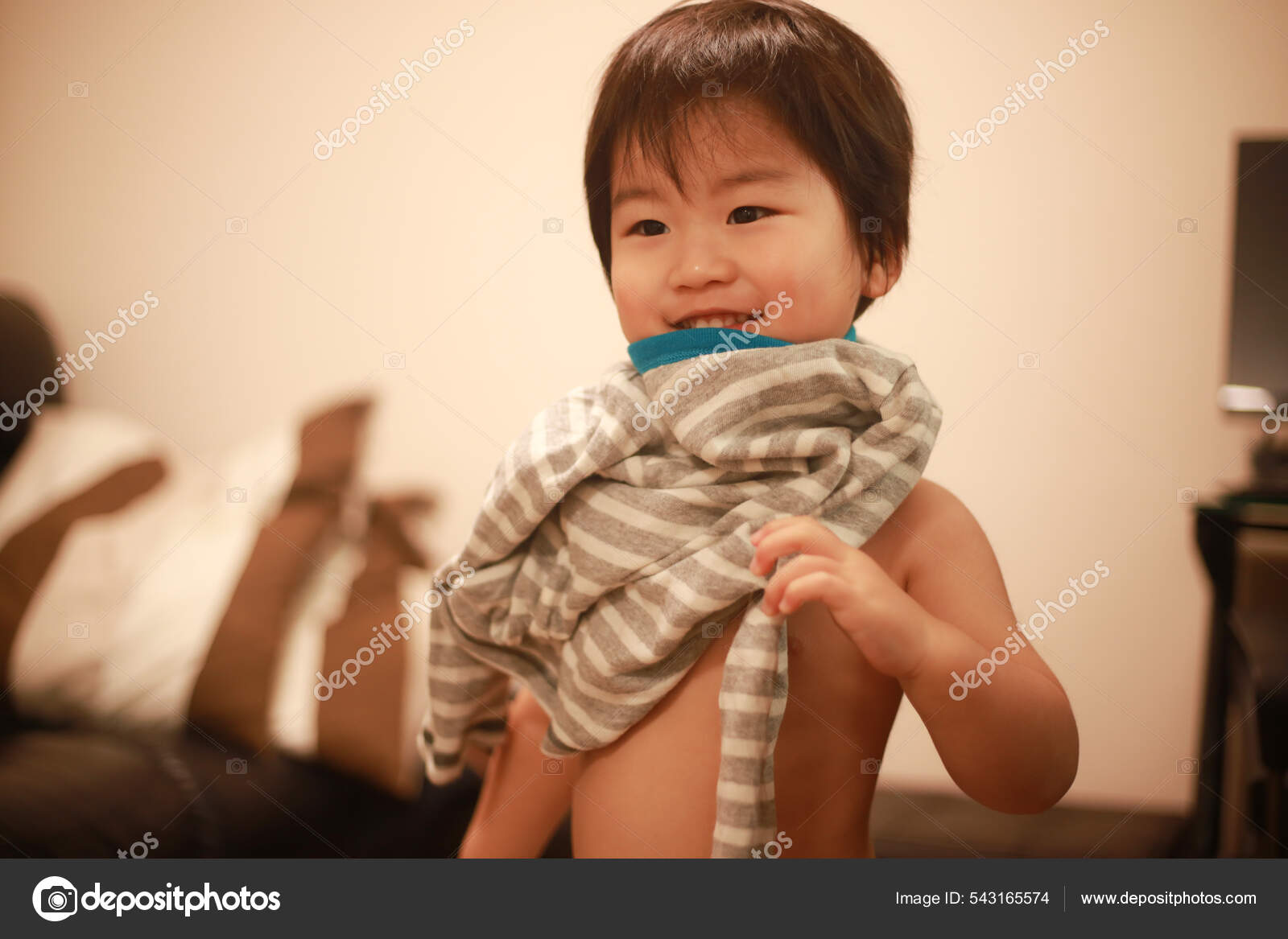 Little Boy Taking His Clothes Stock Photo by ©yamasan 543165574