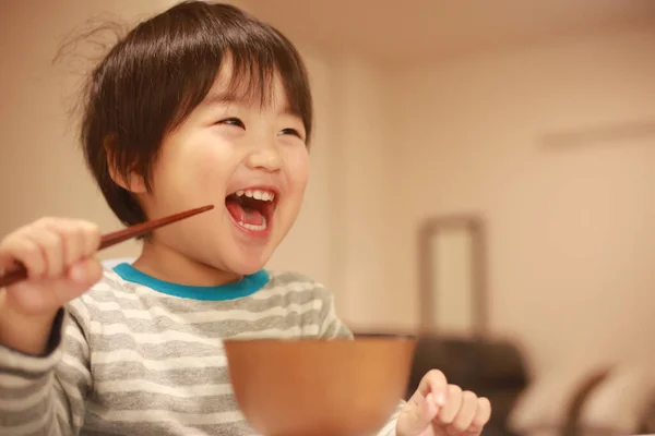 Feliz Asiático Chico Comer Gachas — Foto de Stock