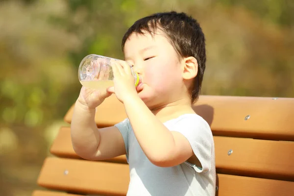 Little Boy Drinking Water Bottle — Stock Photo, Image