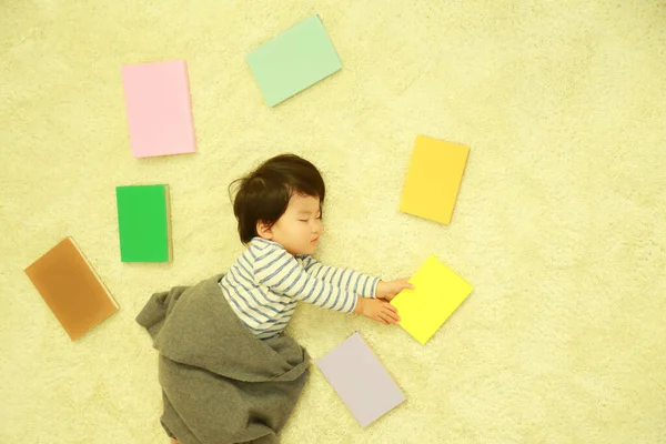 Boy Sleeping Surrounded Books — Stock Photo, Image