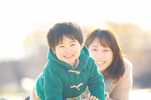 Young Asian Mother Her Little Boy Smiling Park — ストック写真