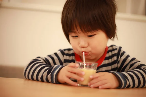 Little Child Drinking Beverage Glass — Stock Photo, Image