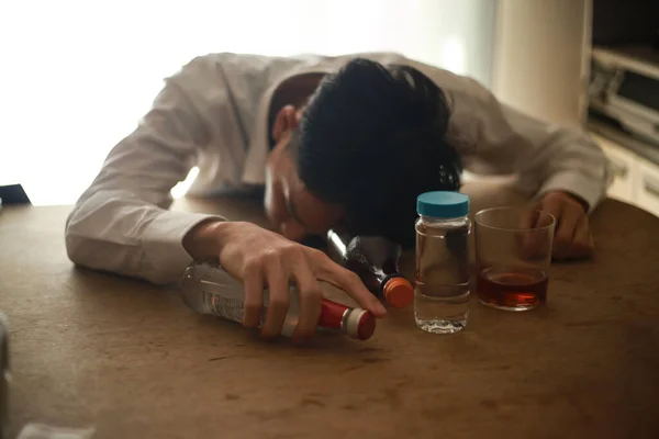 Asian Man Lying Table Alcohol Drinks Overdose Concept — Stock Photo, Image