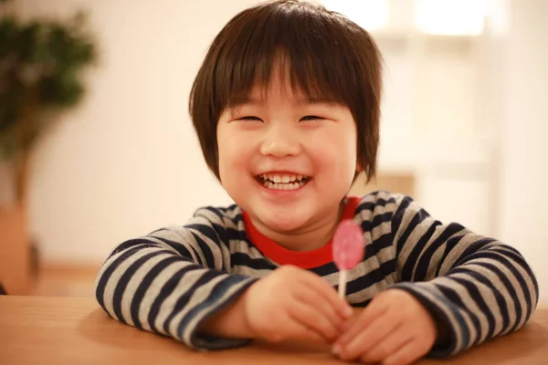 Portrait Cute Child Holding Lollipop Looking Camera — Stock Photo, Image