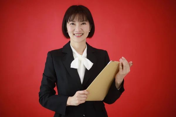 Young Asian Business Woman Holding Documents Studio — Stock Photo, Image