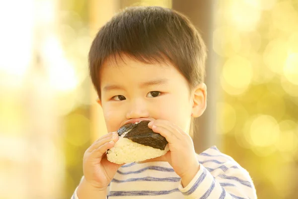 Imagem Menino Comendo Bolas Arroz — Fotografia de Stock