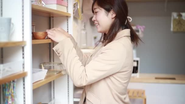 Female Clerk Serving Customers — Stock Video