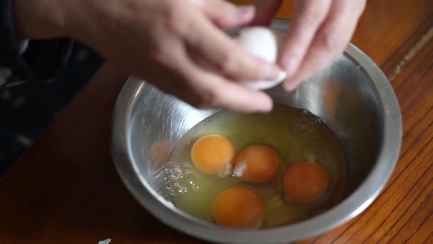 Woman Breaking Egg — Stock Video